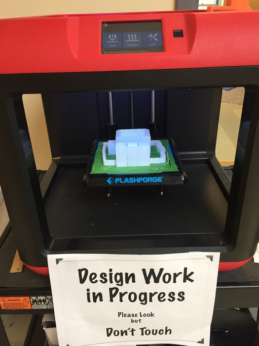 Our 3D Printer is creating a 4th grader's design!